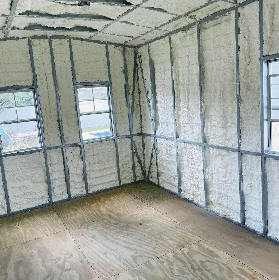 Closed-cell spray foam insulation applied to wall cavities in a residential project in Tampa