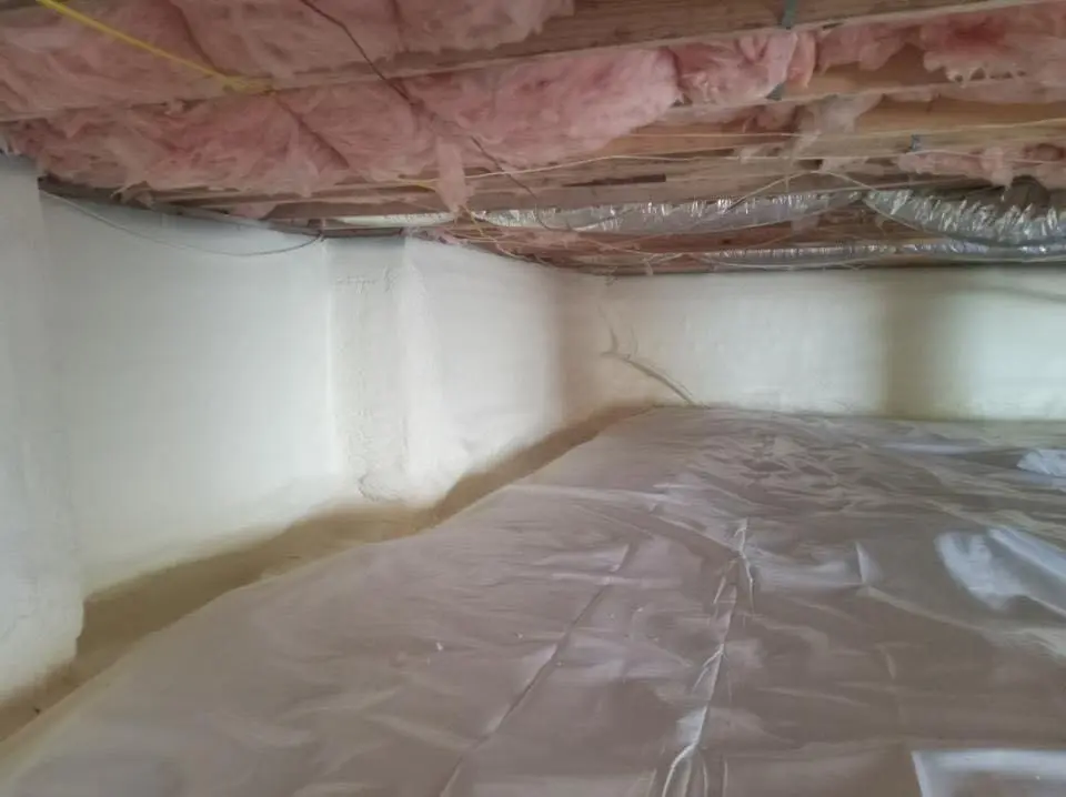 Crawl space encapsulation with closed-cell spray foam for Roof Waterproofing in Tampa
